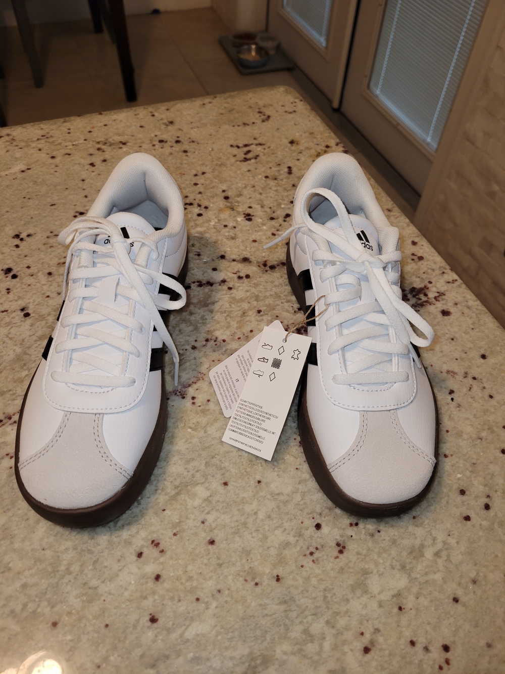 Adidas Men’s White and Black Casual Sneakers